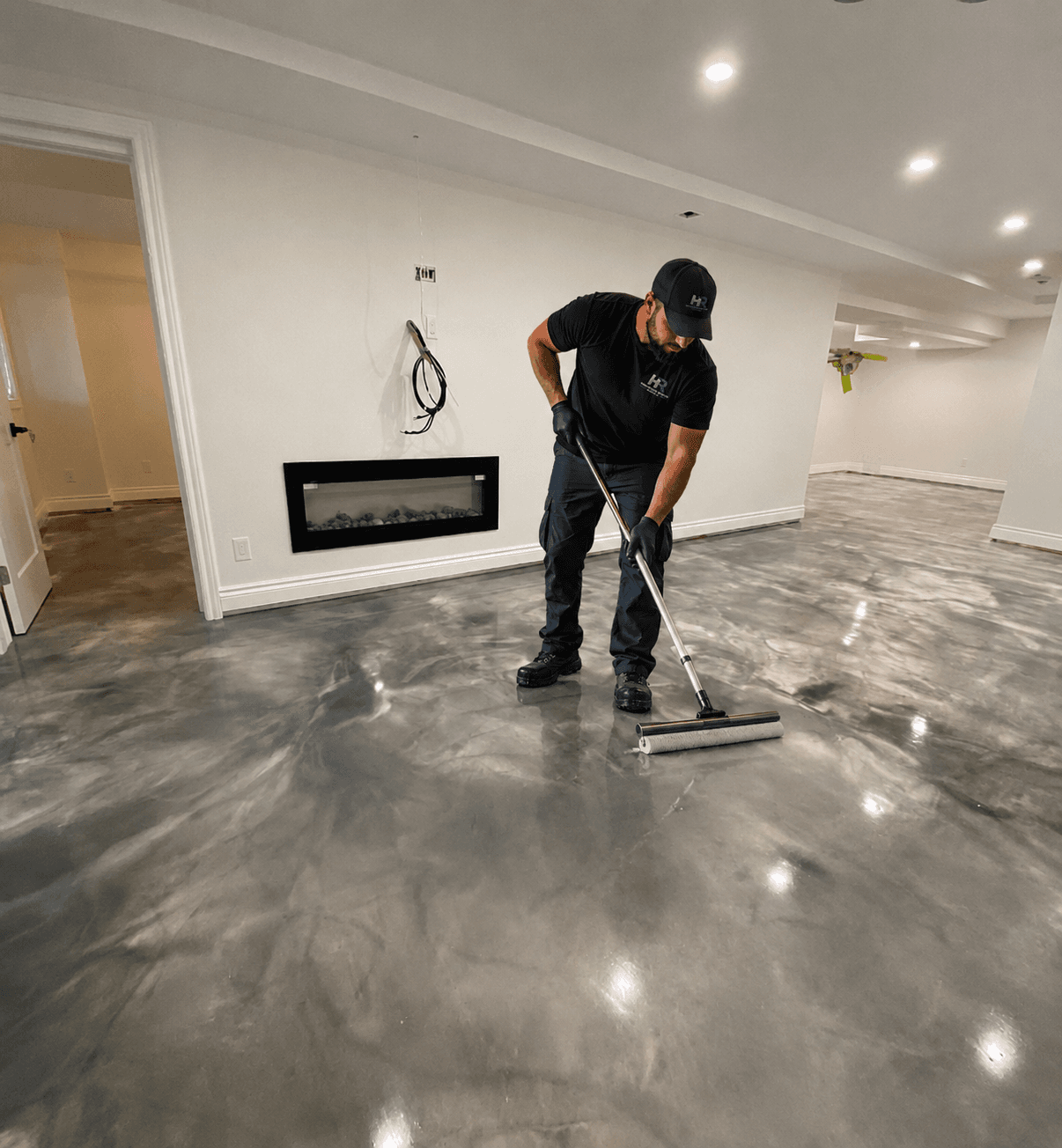Hampton Roads Epoxy technician applying an epoxy floor coating